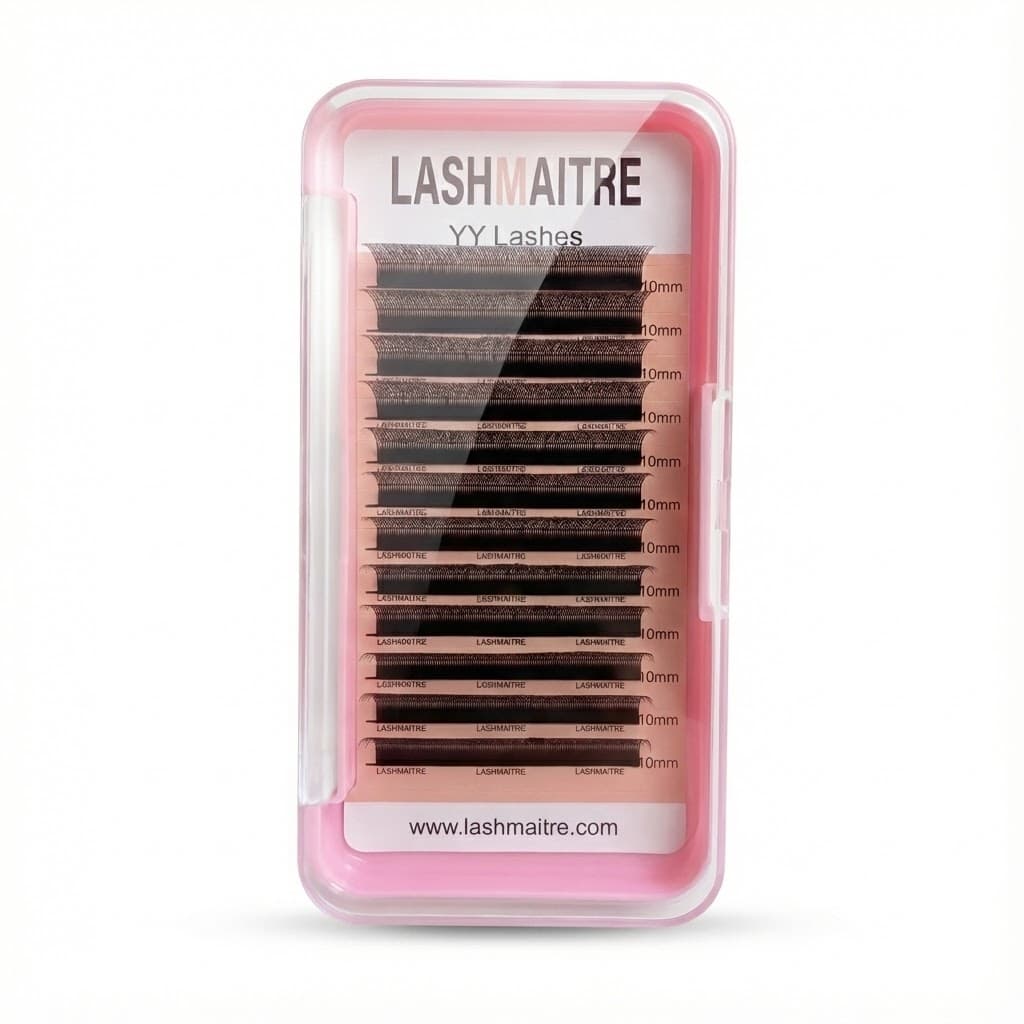 A professional arrangement of LASHMAITRE wholesale YY eyelash extensions trays, systematically organized by curl and thickness for U.S. salon restocking.