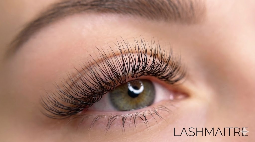 Macro beauty photography showing a perfectly isolated and clean lash line, illustrating the flawless results achieved when clients properly clean and maintain eyelash extensions.