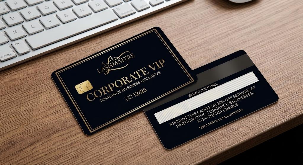 Mockup of LASHMAITRE black and gold Corporate VIP discount card on a desk. Marketing material for eyelash extensions Torrance corporate clients, offering an exclusive 20% off services for local business partnerships and employee perks.