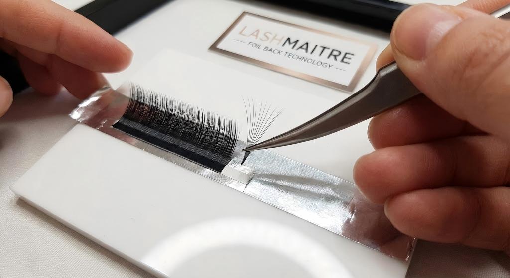 Volume fans easily created from foil backed tape strips using premium c curl eyelash extensions