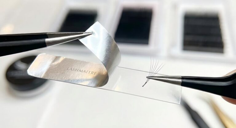 Macro photography of foil backed tape strip ensuring zero residue extraction for precise eyelash extensions mankato