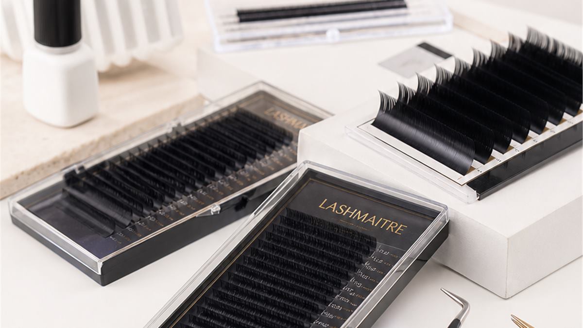 Lash extension kit product layout with trays tweezers and glue support