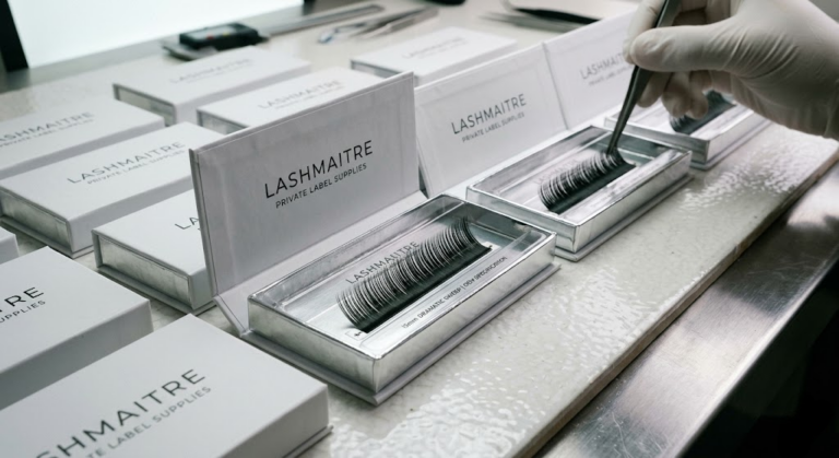 Industrial double-heating thermal fixation system for manufacturing precise curl patterns in specialized, long-length 15mm eyelash extensions, showcasing the OEM production line with PBT fibers wrapped around precision-milled aluminum rods.