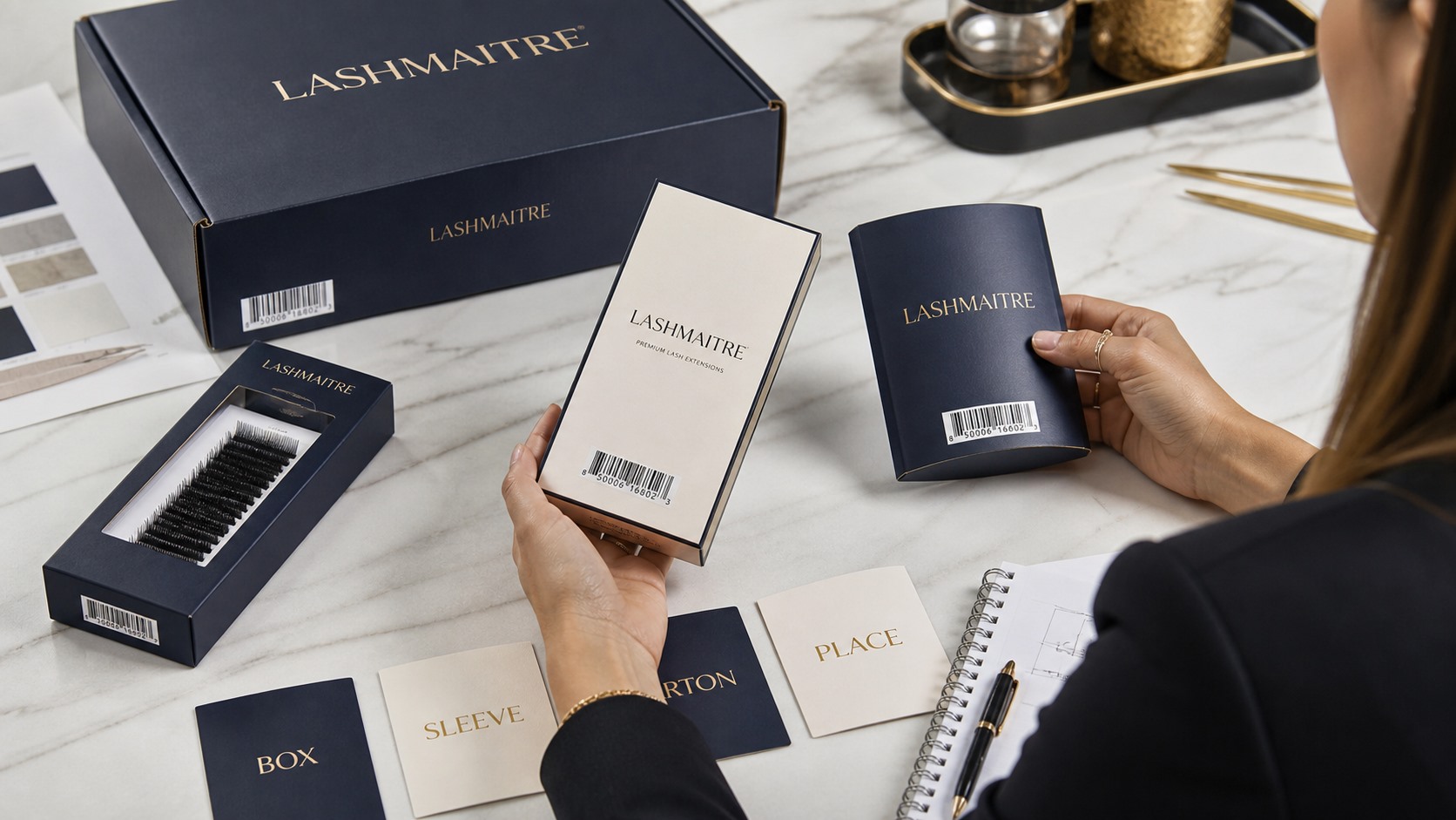 Barcode placement compared across LASHMAITRE lash box sleeve and carton packaging